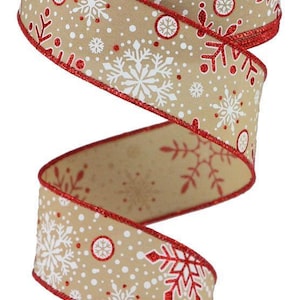 May include: A roll of brown and white ribbon with a red glitter edge. The ribbon is decorated with white snowflakes and red dots.