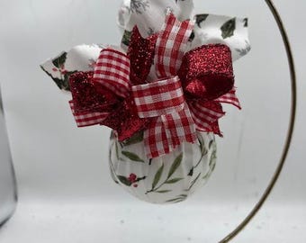 Christmas Holly Fabric on a 100MM Ball Ornament Adorned a Variety of Ribbons and greenery  Handmade Ornament