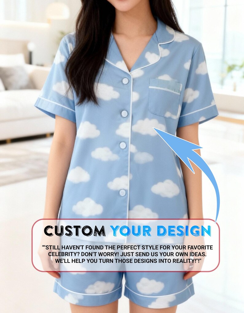 A woman wearing a blue pajama top with a cloud pattern, standing in a room with a couch and a window in the background.