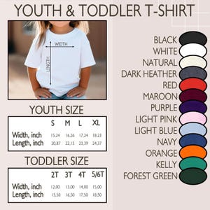 May include: White youth and toddler t-shirt with size and colour options. The image shows a child wearing the shirt, with measurements in inches for width and length. Available colours include black, white, and navy.