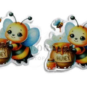 May include: Two stickers featuring a cartoon bee with a jar of honey. The bee is yellow, orange, and black with blue wings. A small jar of honey and a flying bee are also present. The word "HONEY" is on the jar.