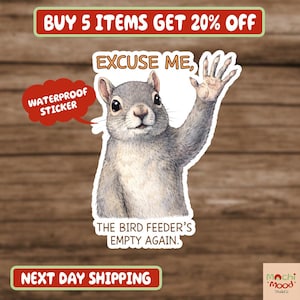 May include: A waterproof sticker featuring a gray squirrel with a raised paw, saying "Excuse Me, The Bird Feeder's Empty Again." The sticker has a red speech bubble that says "Waterproof Sticker."