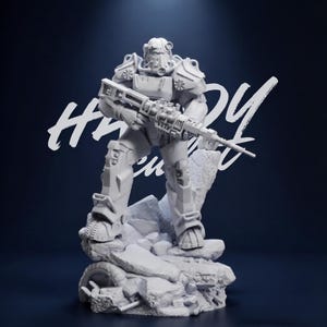 May include: A gray figurine of a character in power armor, holding a rifle, standing on a rocky base. The figure is detailed with armor plating and a helmet. The background is dark blue with white text that reads "Happy".