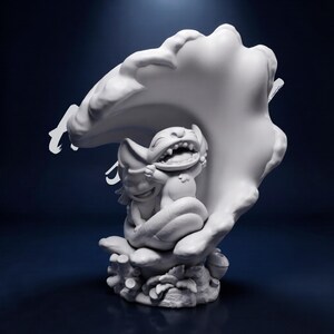 May include: A white sculpture of two cartoon characters, one with a large grin and the other with a smaller smile, nestled together under a large, abstract form. The sculpture is set against a dark blue background, highlighting the details of the figures.
