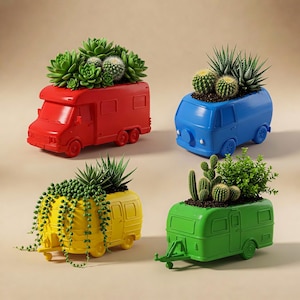 May include: Four brightly coloured campervan-shaped planters, each filled with succulents and cacti. The planters are red, blue, yellow, and green. The plants vary in size and type, creating a vibrant display. The planters have wheels and windows.