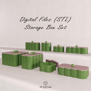Puede incluir: Un conjunto de cajas de almacenamiento verdes y rosas con tapas. Las cajas tienen un diseño redondeado y festoneado y están dispuestas en grupo. El texto "Digital Files (STL) Storage Box Set" está en la parte superior.