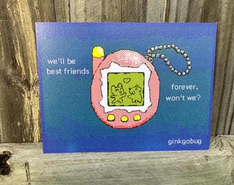 May include: A rectangular print featuring a pixel art illustration of a pink digital pet device on a blue background. The screen displays two creatures and a heart. Text reads: we'll be best friends forever, won't we? and the word ginkgobug.