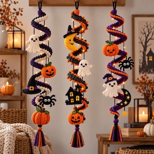 May include: Three hanging crochet spiral decorations featuring Halloween motifs. Each spiral is adorned with small white ghosts, orange pumpkins, black witch hats, spiders, a yellow crescent moon, and a black haunted house, finished with a colorful tassel.
