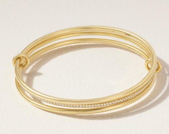 Pulseira de ouro 18k com múltiplos elos cravejados de diamantes, pulseira bicolor conectada.