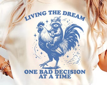 Living the Dream One Bad Decision PNG SVG, Funny Raccoon Riding Rooster Shirt Design, Coffee Chaos Trash Panda Quote