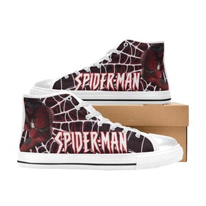 May include: High-top canvas sneakers featuring a Spider-Man design. The shoes have a white rubber sole and toe cap, with a burgundy and white web pattern. The words "SPIDER-MAN" are prominently displayed.