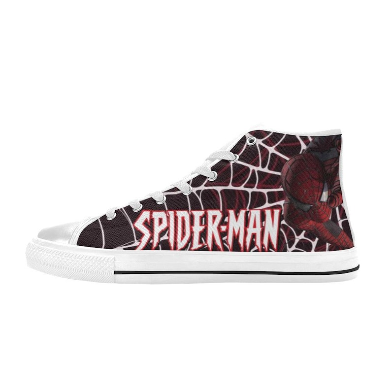 May include: High-top canvas sneakers featuring a Spider-Man design. The shoes have a white rubber sole and laces, with a red and black web pattern and the words "SPIDER-MAN" on the side. The Spider-Man character is also visible.