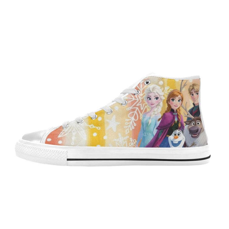 May include: High-top canvas sneakers featuring a colorful design with characters from the animated movie Frozen. The shoes have a white rubber sole, white laces, and a vibrant graphic on the side.