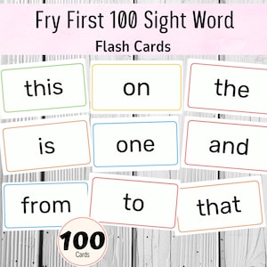 May include: A set of Fry First 100 Sight Word flash cards featuring white rectangular cards with black text and coloured borders. The cards display words such as this, on, the, is, one, and, from, to, and that. A circular badge indicates 100 Cards.