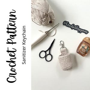 May include: A crochet pattern for a beige sanitizer keychain. The pattern includes instructions for crocheting a small pouch to hold a travel-sized bottle of hand sanitizer. The image also shows a crochet hook, scissors, yarn, and a bottle of hand sanitizer.