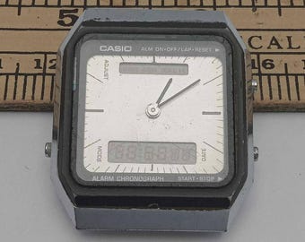 Casio AQ-102 Alarm Chronograph 302 Ana-Digi Quartz-klocka – För delar, reparation