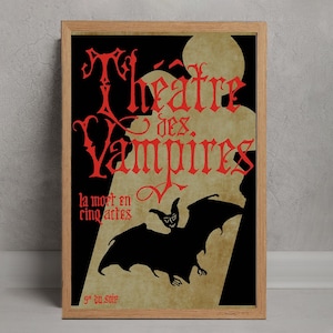Op de afbeelding: Ingelijste poster met een vintage ontwerp. De poster toont de woorden "Théâtre des Vampires" in rode gotische letters, een zwart vleermuissilhouet en de tekst "la mort en cinq actes". De achtergrond is bruin en zwart.