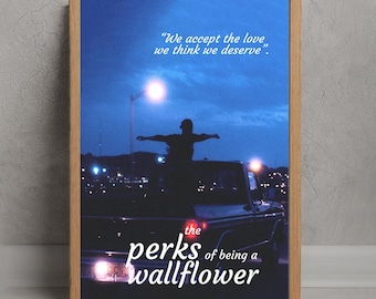 May include: Framed poster featuring a silhouette of a person with outstretched arms on a truck bed at dusk. The poster includes the quote "We accept the love we think we deserve" and the title "the perks of being a wallflower".