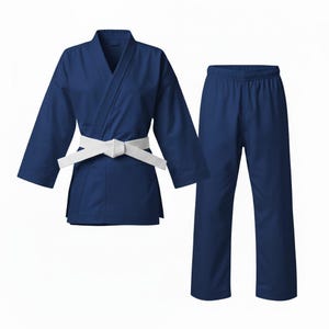 May include: A navy blue martial arts uniform, comprising a jacket with a white belt and matching trousers. The uniform is designed for training and competition.