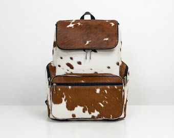 Zaino in vera pelle di vacchetta fatto a mano - Borsa da viaggio western con pelo bianco marrone sul pannolino del bambino