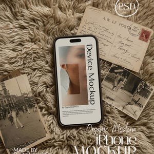 May include: An iPhone mockup with a black frame, displaying a close-up of a face. The phone is placed on a fluffy, beige surface, accompanied by vintage postcards and a photograph. The text "Device Mockup" is visible on the phone screen.