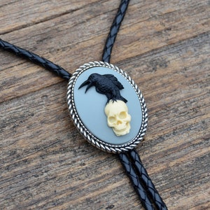 Raven and Skull Bolo Tie - Oval - Customizable Cord Color, Tips and Length - Ask About Gold Tips - Express Yourself!