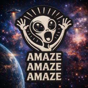 May include: Embroidered patch featuring a surprised alien with outstretched arms, surrounded by a black border with radiating lines. The word "AMAZE" is stacked three times below the alien. The background shows a galaxy with planets and UFOs.