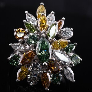 Multicolor Fancy Diamond Cluster Ring, Platinum Cocktail Statement Ring. This gorgeous ring is crafted in Platinum, set with  diamonds of various colors, Green, Orange, Olive & White diamonds.