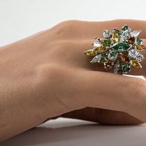 Multicolor Fancy Diamond Cluster Ring, Platinum Cocktail Statement Ring. This gorgeous ring is crafted in Platinum, set with  diamonds of various colors, Green, Orange, Olive & White diamonds.