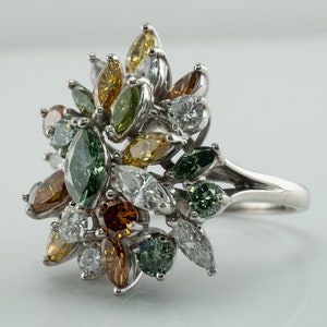Multicolor Fancy Diamond Cluster Ring, Platinum Cocktail Statement Ring. This gorgeous ring is crafted in Platinum, set with  diamonds of various colors, Green, Orange, Olive & White diamonds.