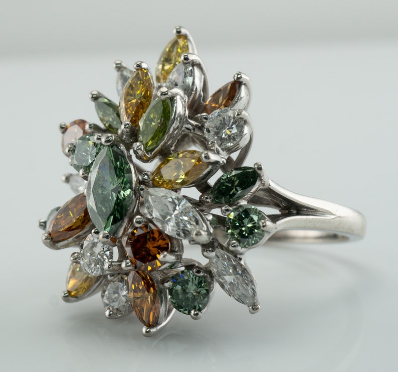 Multicolor Fancy Diamond Cluster Ring, Platinum Cocktail Statement Ring. This gorgeous ring is crafted in Platinum, set with  diamonds of various colors, Green, Orange, Olive & White diamonds.
