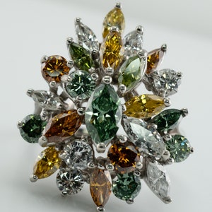 Multicolor Fancy Diamond Cluster Ring, Platinum Cocktail Statement Ring. This gorgeous ring is crafted in Platinum, set with  diamonds of various colors, Green, Orange, Olive & White diamonds.