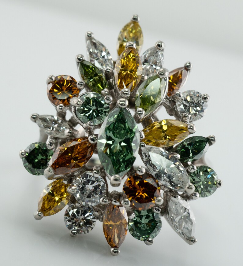 Multicolor Fancy Diamond Cluster Ring, Platinum Cocktail Statement Ring. This gorgeous ring is crafted in Platinum, set with  diamonds of various colors, Green, Orange, Olive & White diamonds.