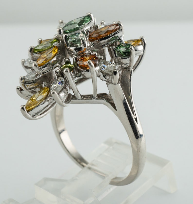 Multicolor Fancy Diamond Cluster Ring, Platinum Cocktail Statement Ring. This gorgeous ring is crafted in Platinum, set with  diamonds of various colors, Green, Orange, Olive & White diamonds.