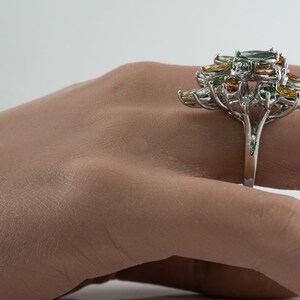 Multicolor Fancy Diamond Cluster Ring, Platinum Cocktail Statement Ring. This gorgeous ring is crafted in Platinum, set with  diamonds of various colors, Green, Orange, Olive & White diamonds.