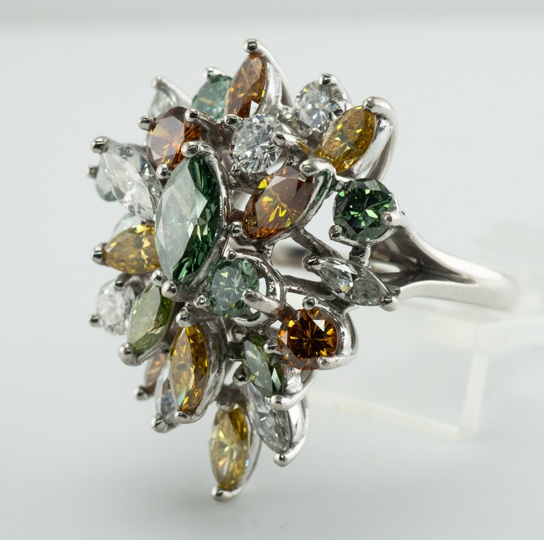 Multicolor Fancy Diamond Cluster Ring, Platinum Cocktail Statement Ring. This gorgeous ring is crafted in Platinum, set with  diamonds of various colors, Green, Orange, Olive & White diamonds.