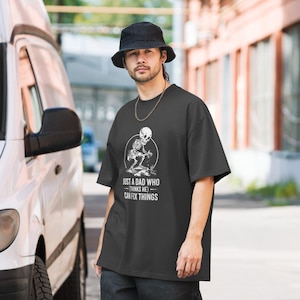 Just a Dad Who (Thinks He) Can Fix Things – Oversized Faded Heavyweight T-Shirt | Funny Skeleton Dad Design | Father’s Day Gift | McXinetje-