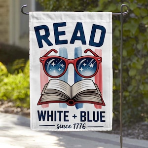 May include: A white garden flag with the words "READ" and "WHITE + BLUE since 1776". The flag features red sunglasses with a starry sky design, a red and white striped background, and an open book.