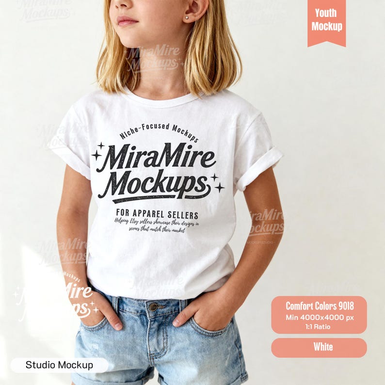 May include: A white short-sleeve t-shirt featuring black text that reads Niche-Focused Mockups MiraMire Mockups FOR APPAREL SELLERS Helping Etsy sellers showcase their designs in scenes that match their market, paired with blue denim shorts.
