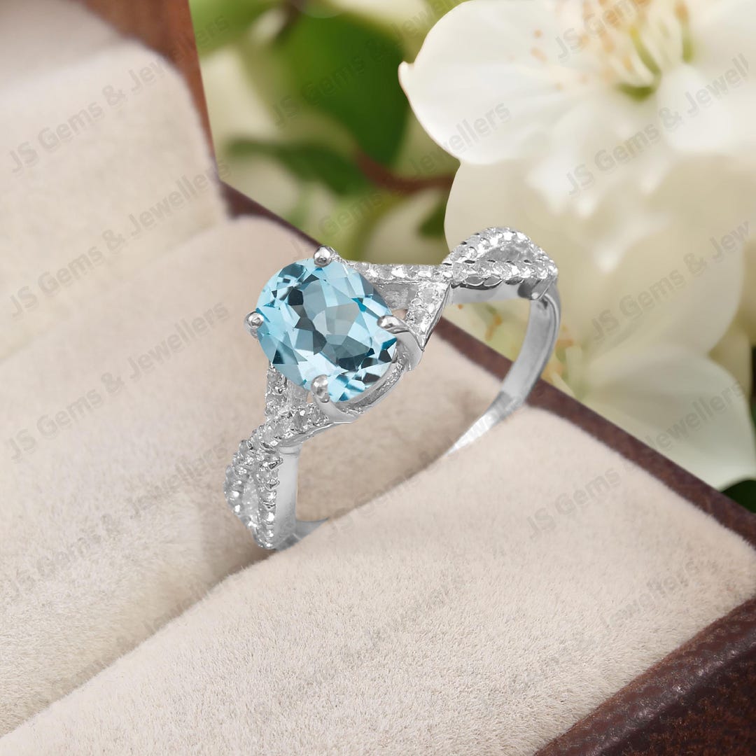 Natural Oval Sky Blue Topaz 925 Sterling Silver Bypass Style Ring ...