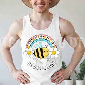 May include: A white ceramic mug with a black handle and the text "But First, Coffee" in a black, bold font. The mug is sitting on a white surface. The mug is approximately 4 inches tall.