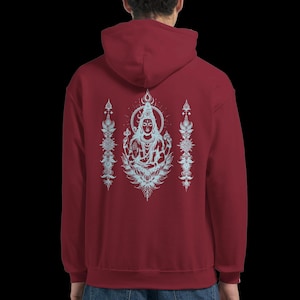 May include: A maroon hoodie featuring a detailed light blue illustration on the back. The design depicts a seated figure surrounded by floral and ornamental elements. The hoodie has a hood and a kangaroo pocket.