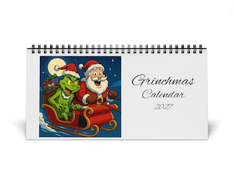May include: A spiral-bound desk calendar featuring a cartoon illustration of a green creature and Santa Claus riding in a red sleigh against a night sky with a full moon. The text on the right side reads Grinchmas Calendar 2027 in black font.