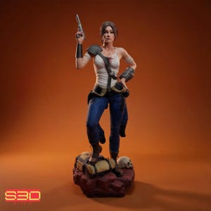 May include: A detailed figurine of a woman in a post-apocalyptic outfit, holding a pistol. She wears a white tank top, blue jeans, and combat boots. The figure stands on a rocky base with a skull and a duffel bag. The background is a gradient of orange.