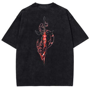 May include: Black t-shirt with a distressed wash. The back features a red and white graphic of a sword and a stylized dragon or serpent design. The graphic has intricate details and a bold, eye-catching appearance.