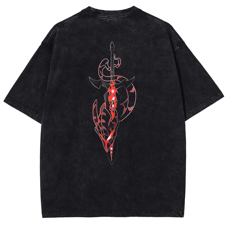 May include: Black t-shirt with a distressed wash. The back features a red and white graphic of a sword and a stylized dragon or serpent design. The graphic has intricate details and a bold, eye-catching appearance.