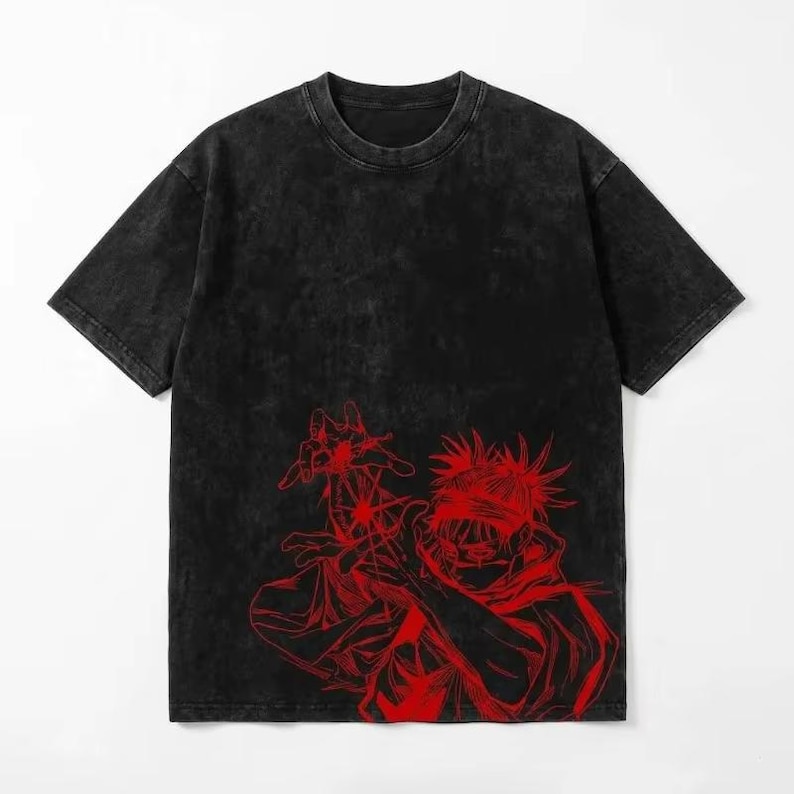 May include: Black t-shirt featuring a red graphic of an anime character. The graphic is a detailed line drawing of a person with a blindfold and spiky hair. The shirt has a washed, vintage appearance.