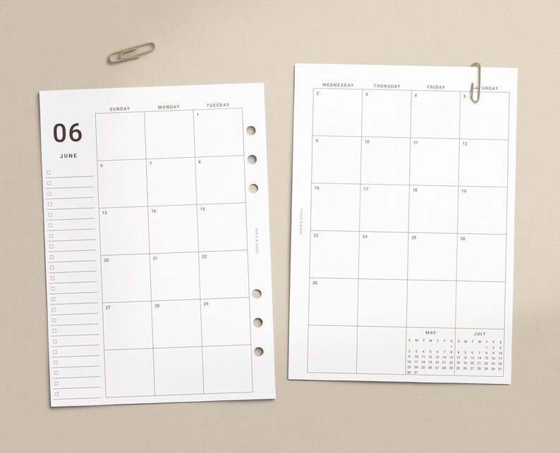 May include: Two white paper calendar inserts with black text and grid lines. The left page shows June with a task list, while the right page shows the remainder of the month with Wednesday through Saturday headers and small May and July calendars.
