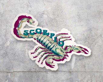 Könnte beinhalten: Ein blaugrüner und weißer Skorpion-Aufkleber mit dem Wort "SCORPIO" in blaugrünen Buchstaben. Der Aufkleber hat einen rosa Umriss und befindet sich auf einem grauen Hintergrund.