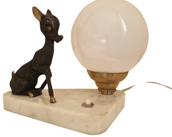 Decorative fawn animal lamp with an opaline shade on a marble base.
